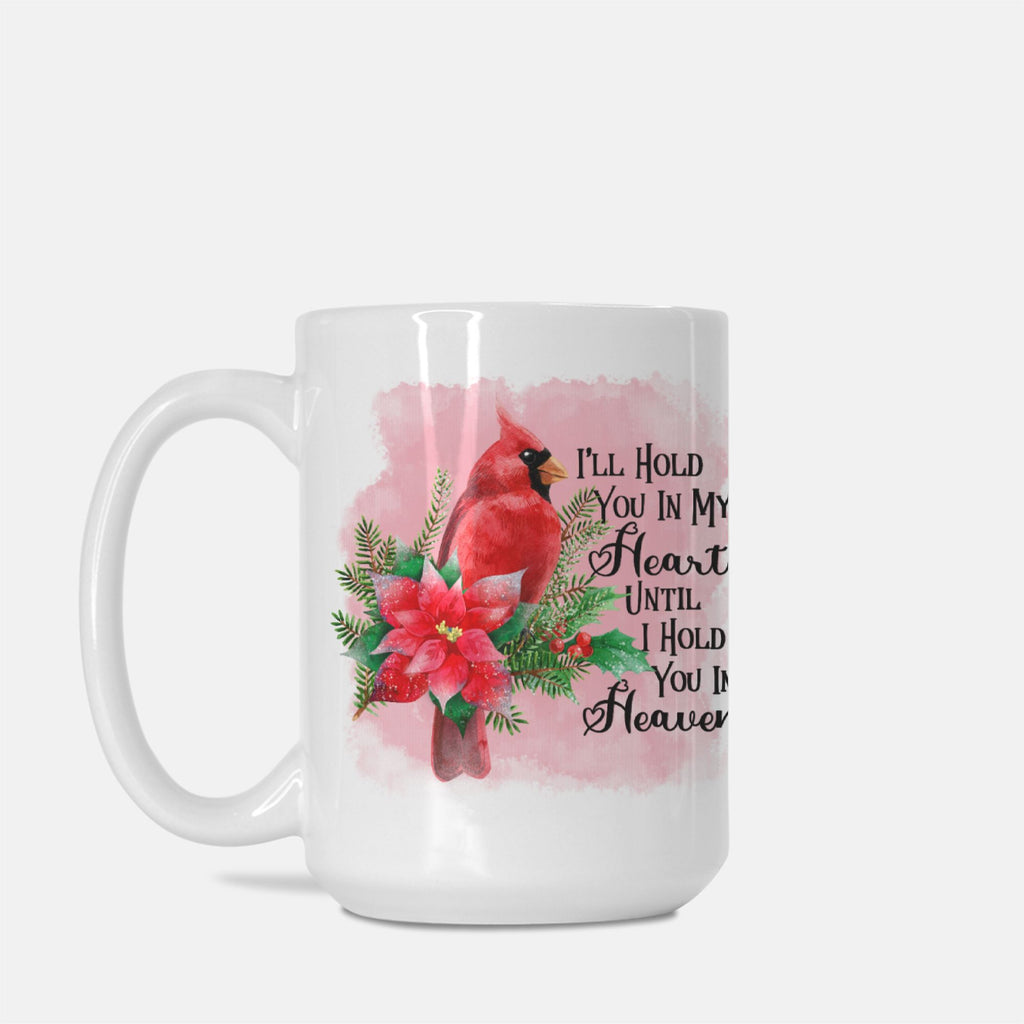 White mug with a red cardinal and floral design on a white background