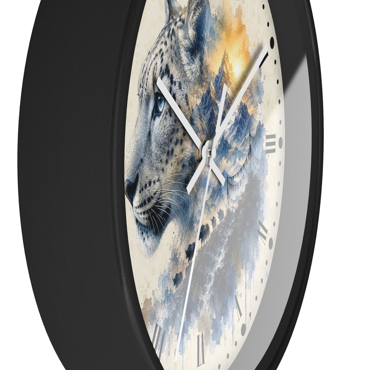 A close-up of a round wall clock with a black frame and a printed face featuring a snow leopard in blue, gray, and cream tones with a warm golden mountain area. The clock is shown against a plain white background.