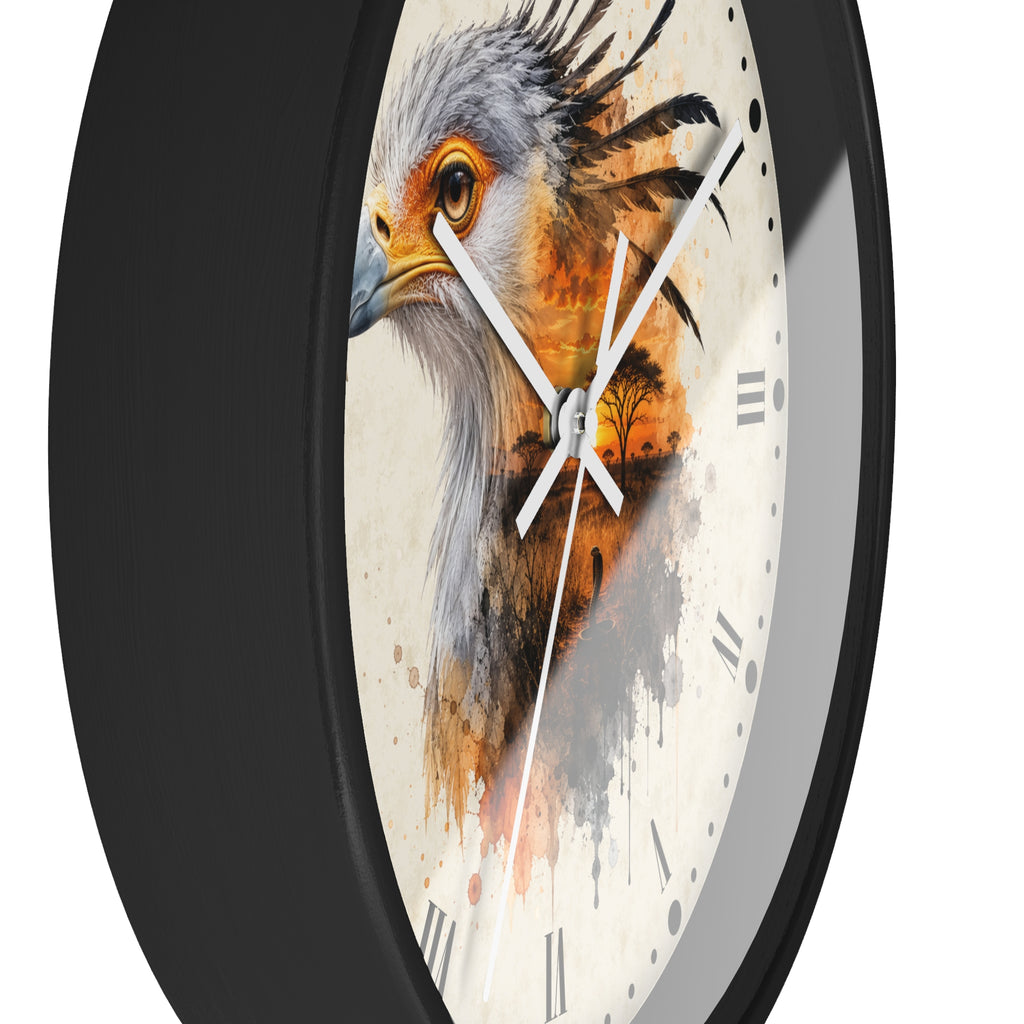 A close-up of a round wall clock with a black frame and a cream-colored face featuring a painted bird design in gray, orange, and brown tones with Roman numerals.