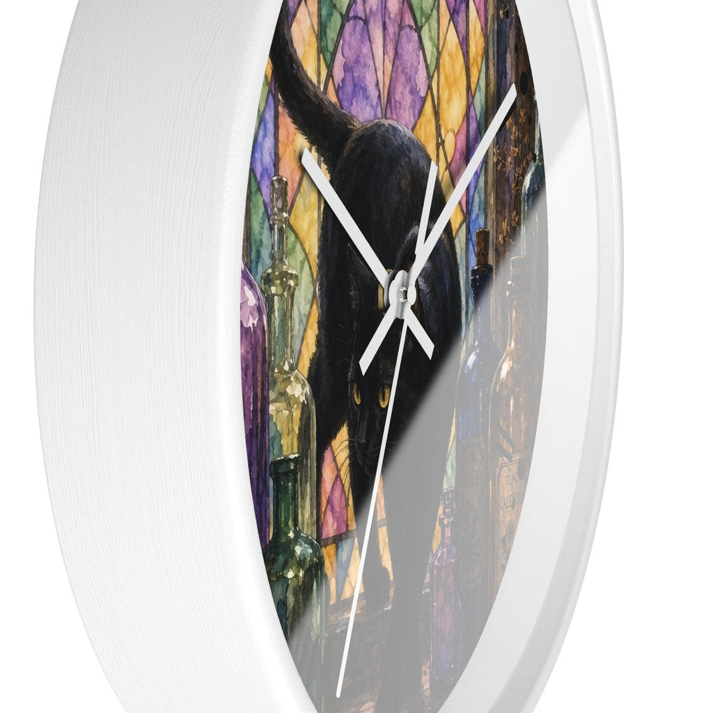 Round wall clock with a white frame and a printed face showing a black cat in front of a colorful stained-glass-style background with wine bottles.