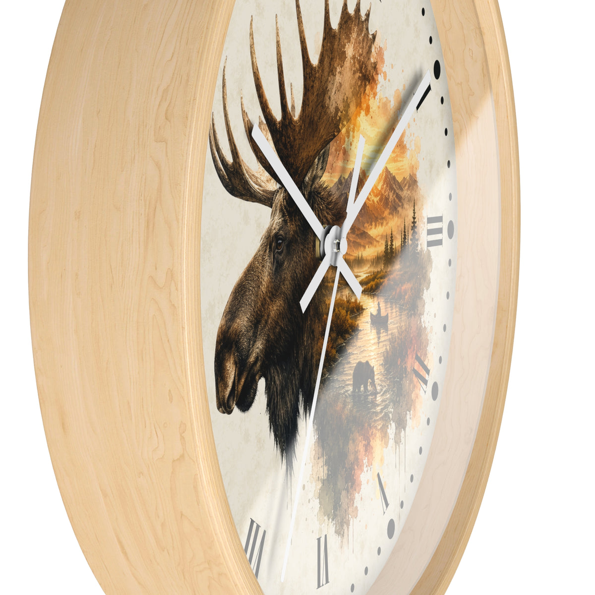 Round wall clock with a light natural wood frame and a printed face featuring a moose head over an autumn landscape scene with warm orange, brown, and cream tones.