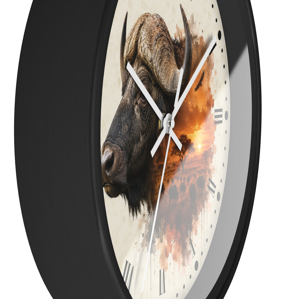 A round wall clock with a black frame and a printed face featuring a close-up watercolor-style portrait of a buffalo over an orange sunset scene, with white hands and black Roman numerals.