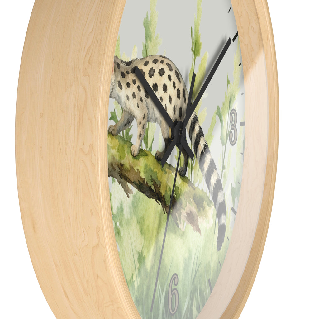 A round wall clock with a light natural wood frame and a printed watercolor design of a spotted big cat walking along a branch against a pale green background. The clock has black hands and gray numerals.