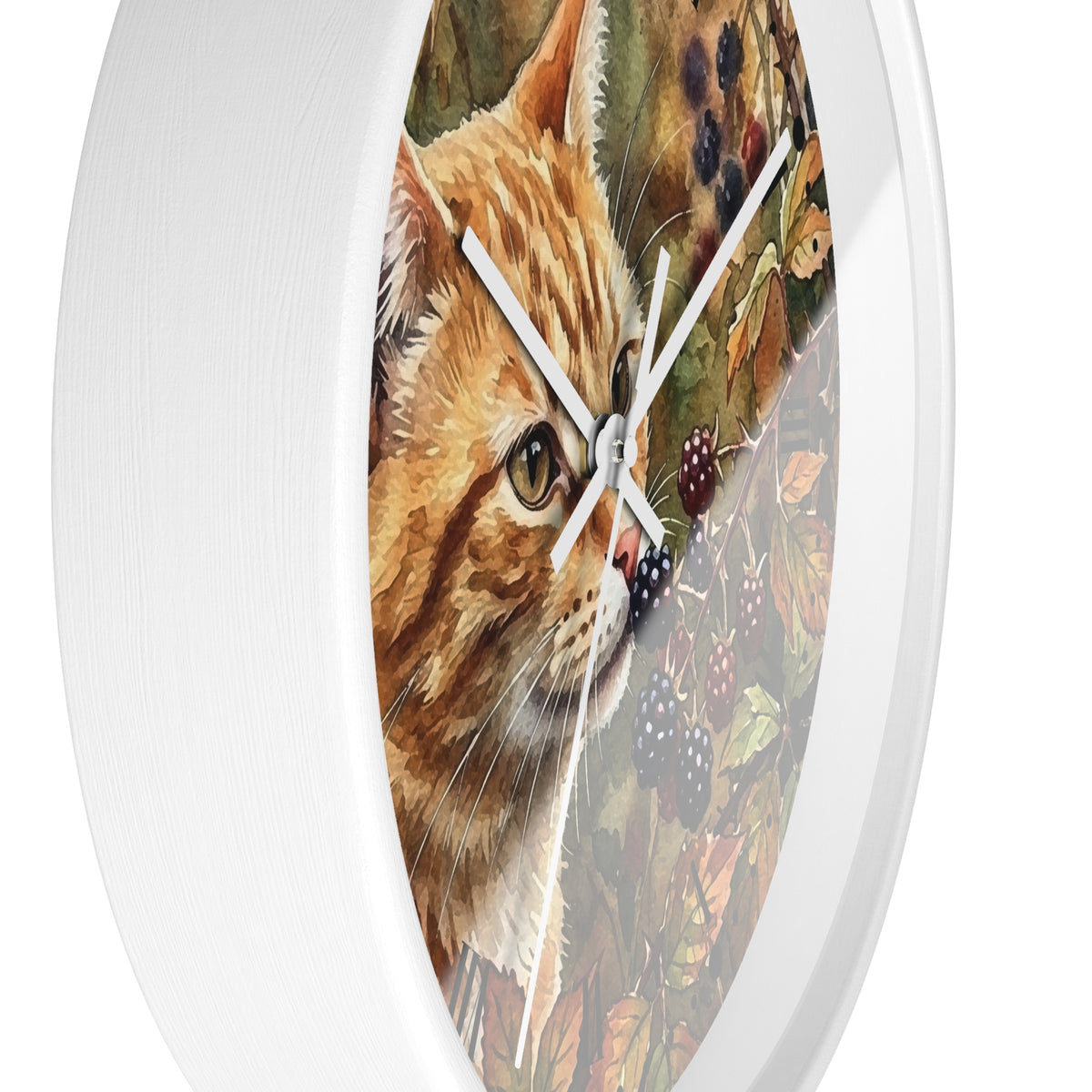 Round wall clock with a white frame and a printed illustration of an orange tabby cat surrounded by leaves and berries on the face, shown against a plain white background.