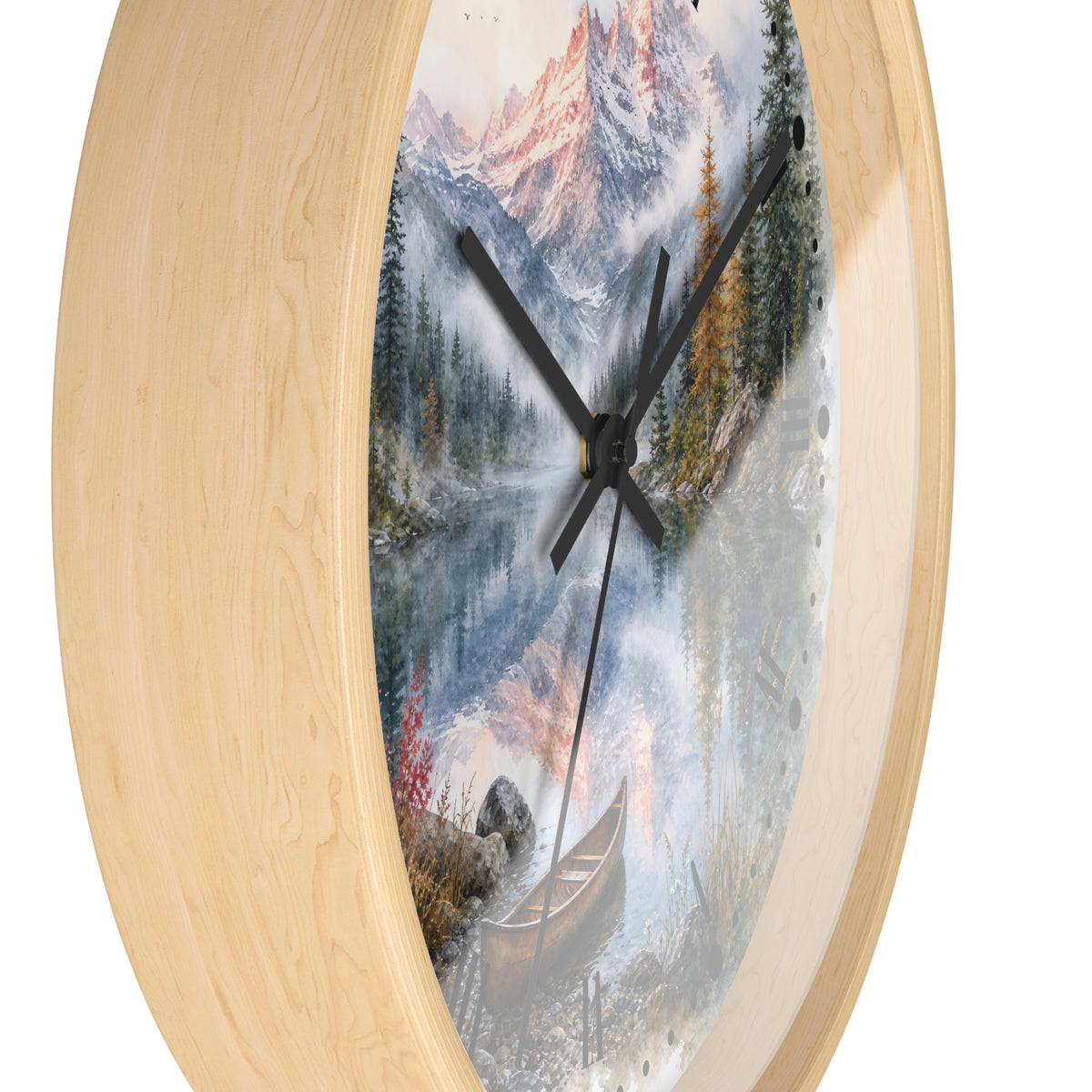 Round wall clock with a light natural wood frame and a scenic landscape print featuring mountains, a lake, trees, and a canoe, shown against a plain white background.