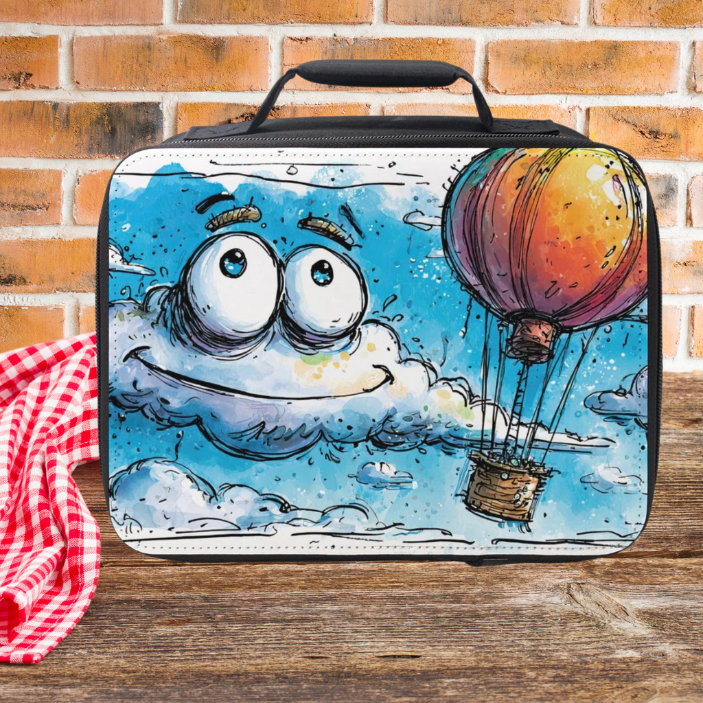 Lunch bag with cartoon design of a cloud and hot air balloon on a wooden table against a brick wall background