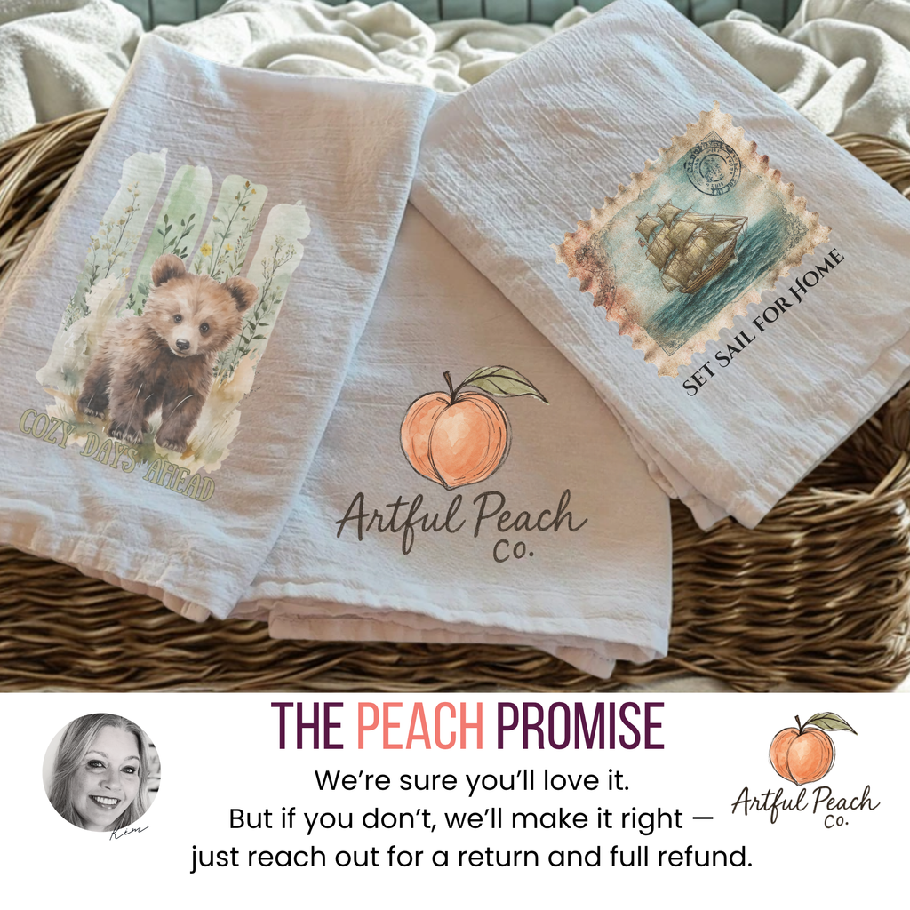 Three folded tea towels with nature-themed designs in a basket, featuring the Artful Peach Co. brand Peach Promise