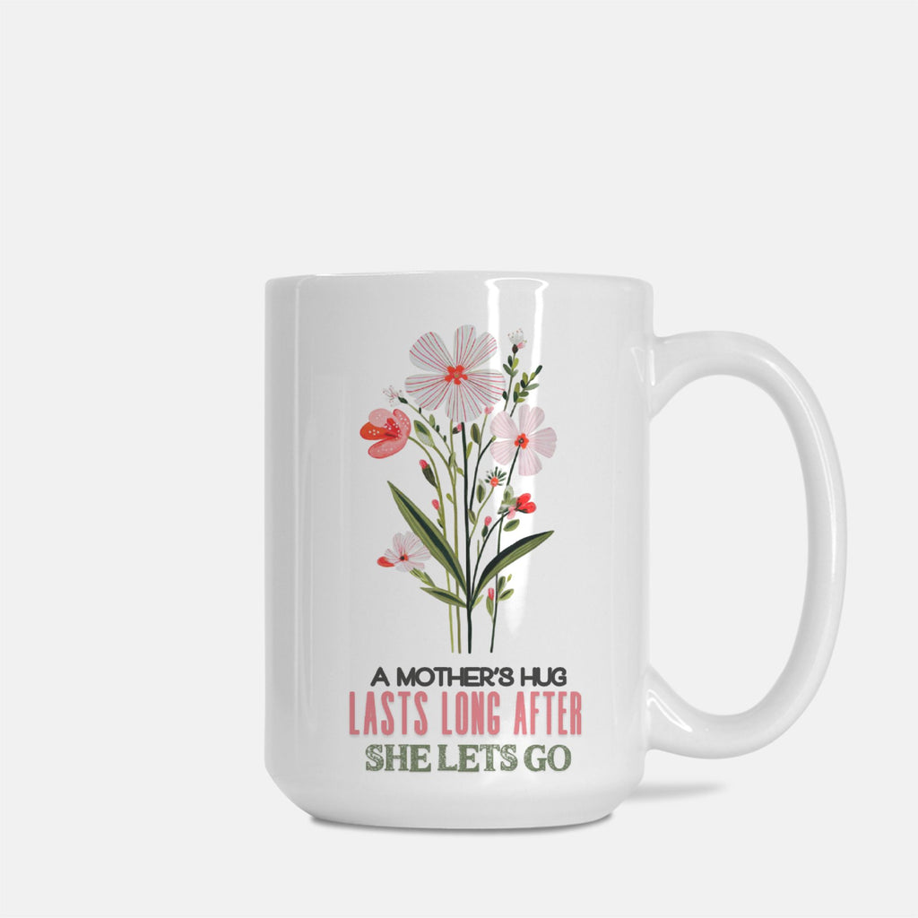 White 15oz mug with floral design and text on a white background