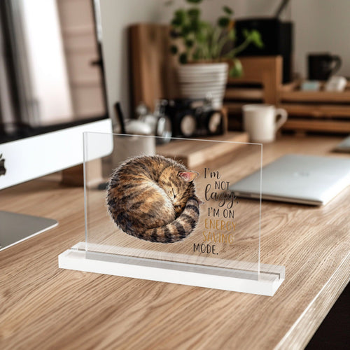 7 inch Acrylic desk table plaque with a cat illustration and text on a desk