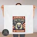 Person holding an extra large tea towel with an eagle design and text celebrating America's 250 years of freedom.