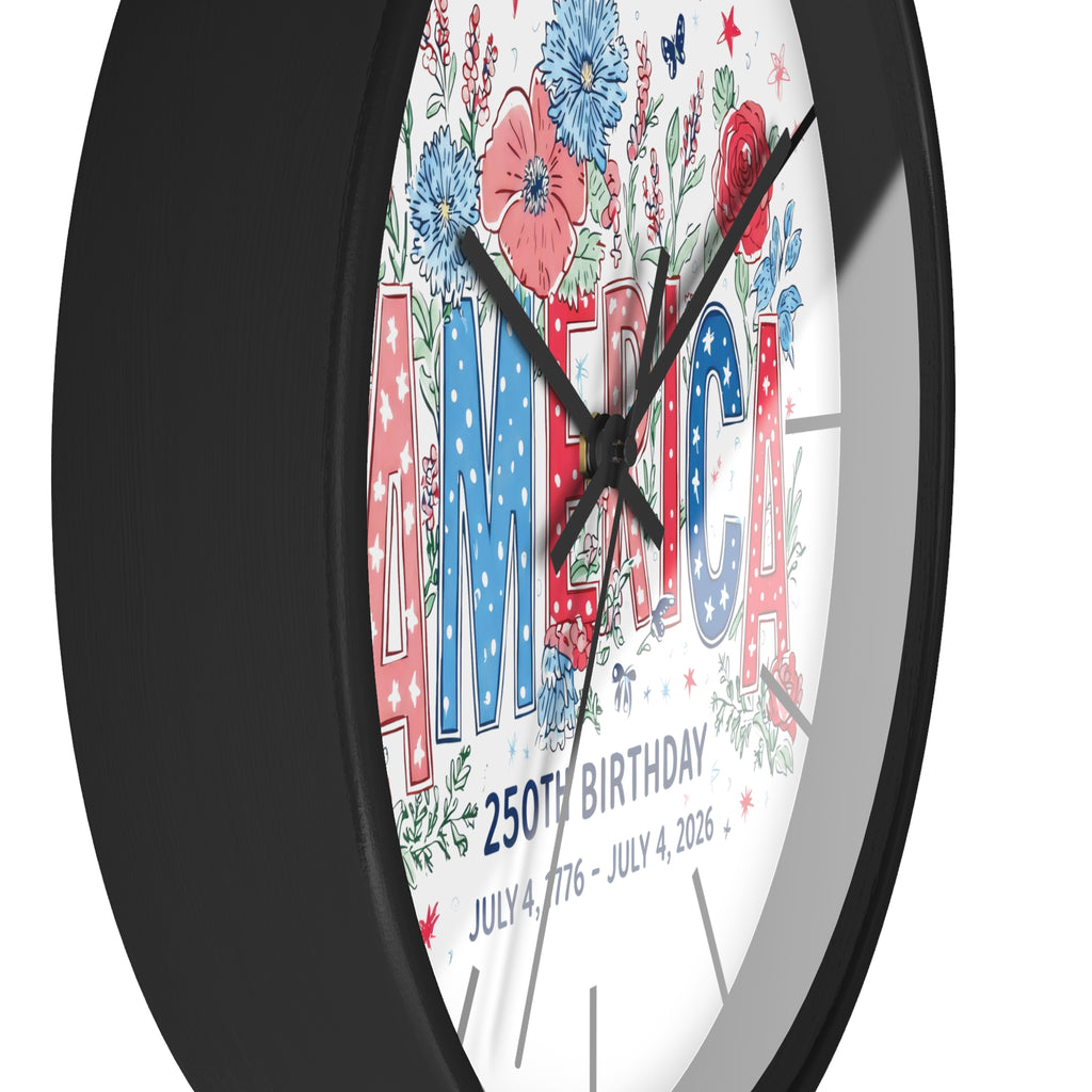Side of round black wall clock with 'AMERICA' and floral design on a white background