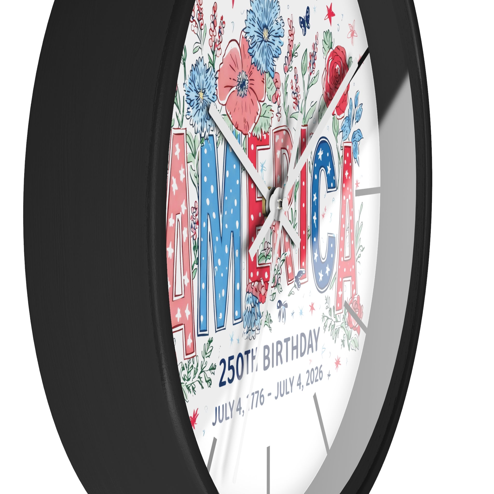 Decorative wall clock with 'AMERICA' and floral design on a white background