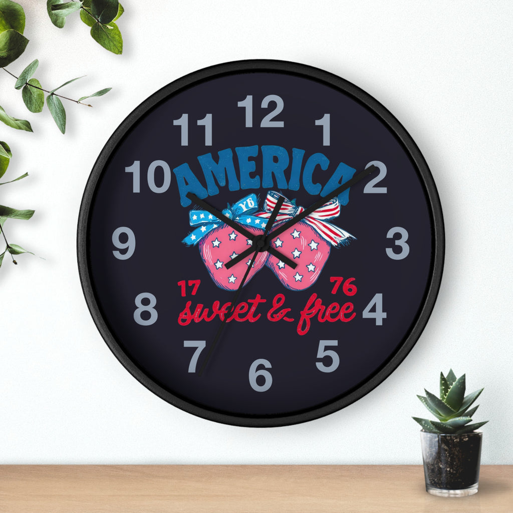 Round Black Wall clock with decorative strawberry fourth of July design and text on a white background