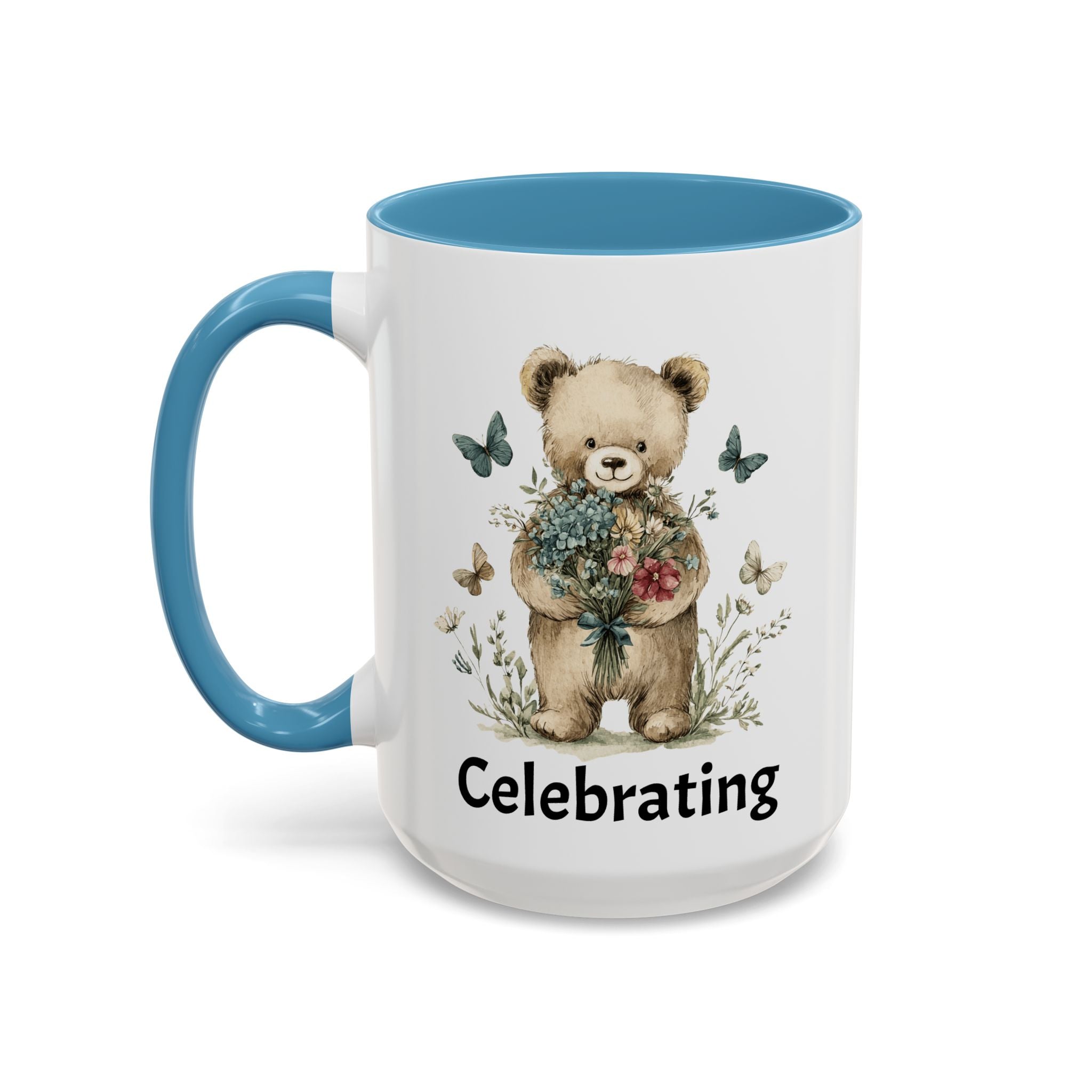 Mug with a teddy bear holding flowers and the word 'Celebrating' on a white background