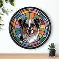 Round black wall clock with a dog's face design on a colorful circular background