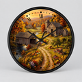 Round wall clock with a black frame and a detailed autumn farm landscape illustration on the face, featuring a covered bridge, barns, a dirt path, trees with fall foliage, and a stream. The clock has black Roman numerals and black hands on a light gray background.