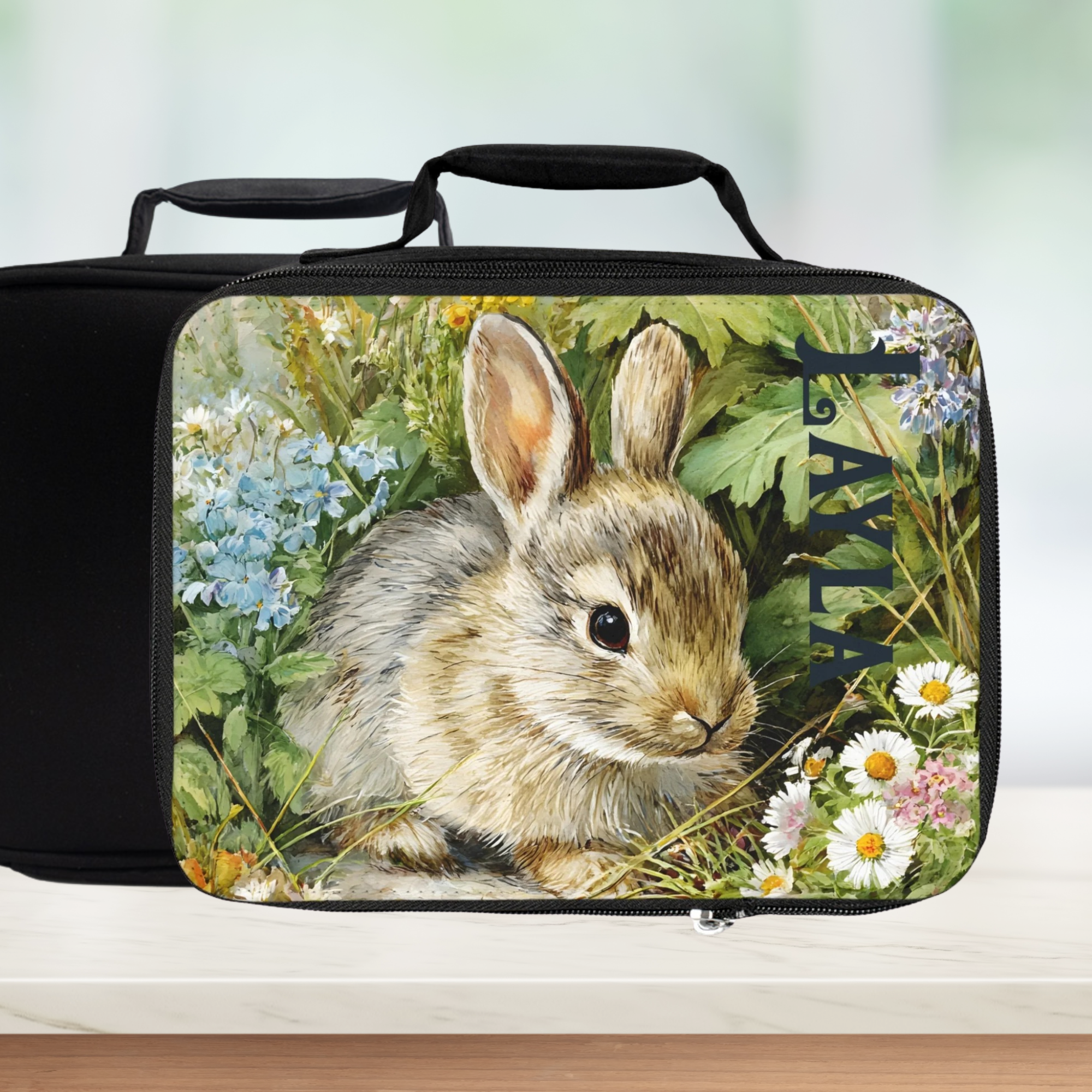  insulated lunch bag with a rabbit design and the name 'Layla' on a white background