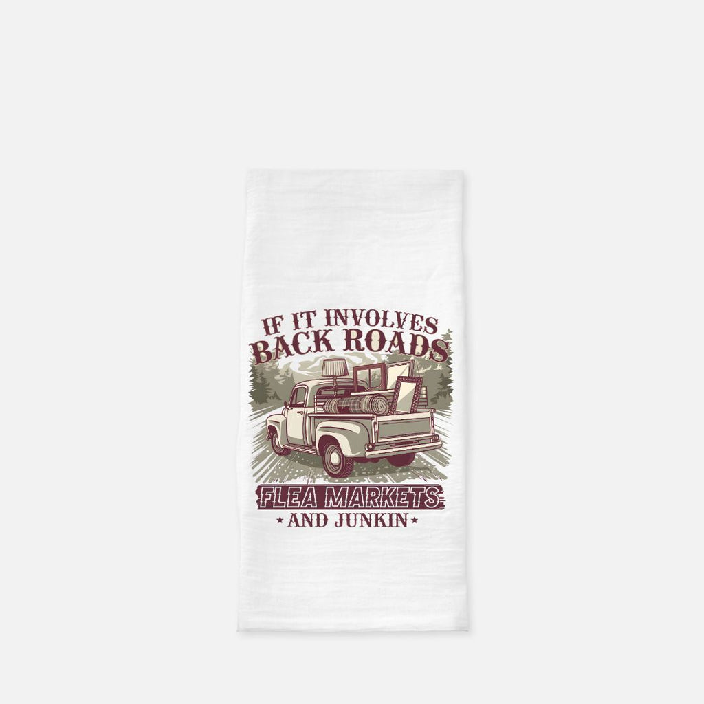 Tea towel with a graphic of a truck and text on a white background