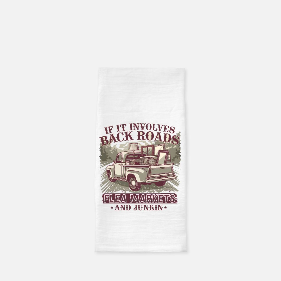 Tea towel with a graphic of a truck and text on a white background