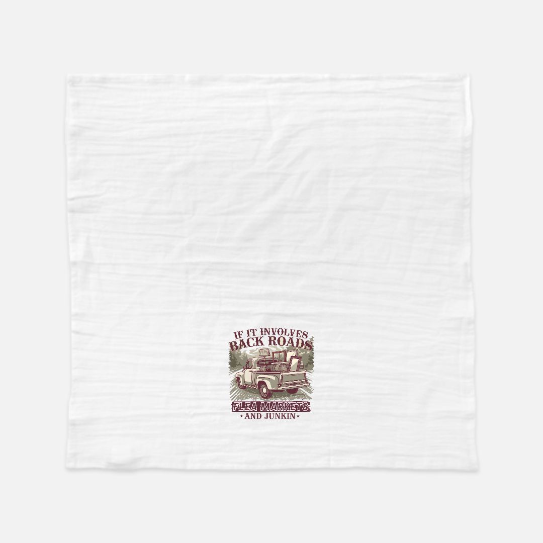 White tea towel with a graphic of a truck and text on a white background