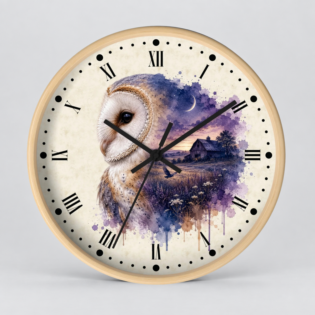 Round wall clock with a light wood frame and a watercolor-style owl illustration on the face. The dial has black Roman numerals, black hour and minute hands, and a purple-toned owl and barn scene with a small moon graphic.