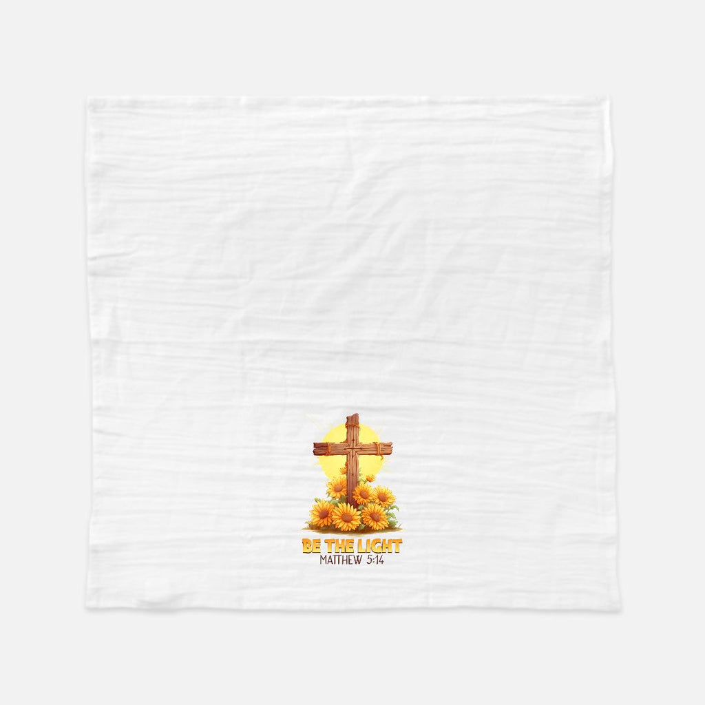 White tea towel (flour sack) with a cross and sunflower design on a white background