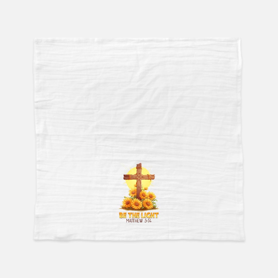 White tea towel (flour sack) with a cross and sunflower design on a white background