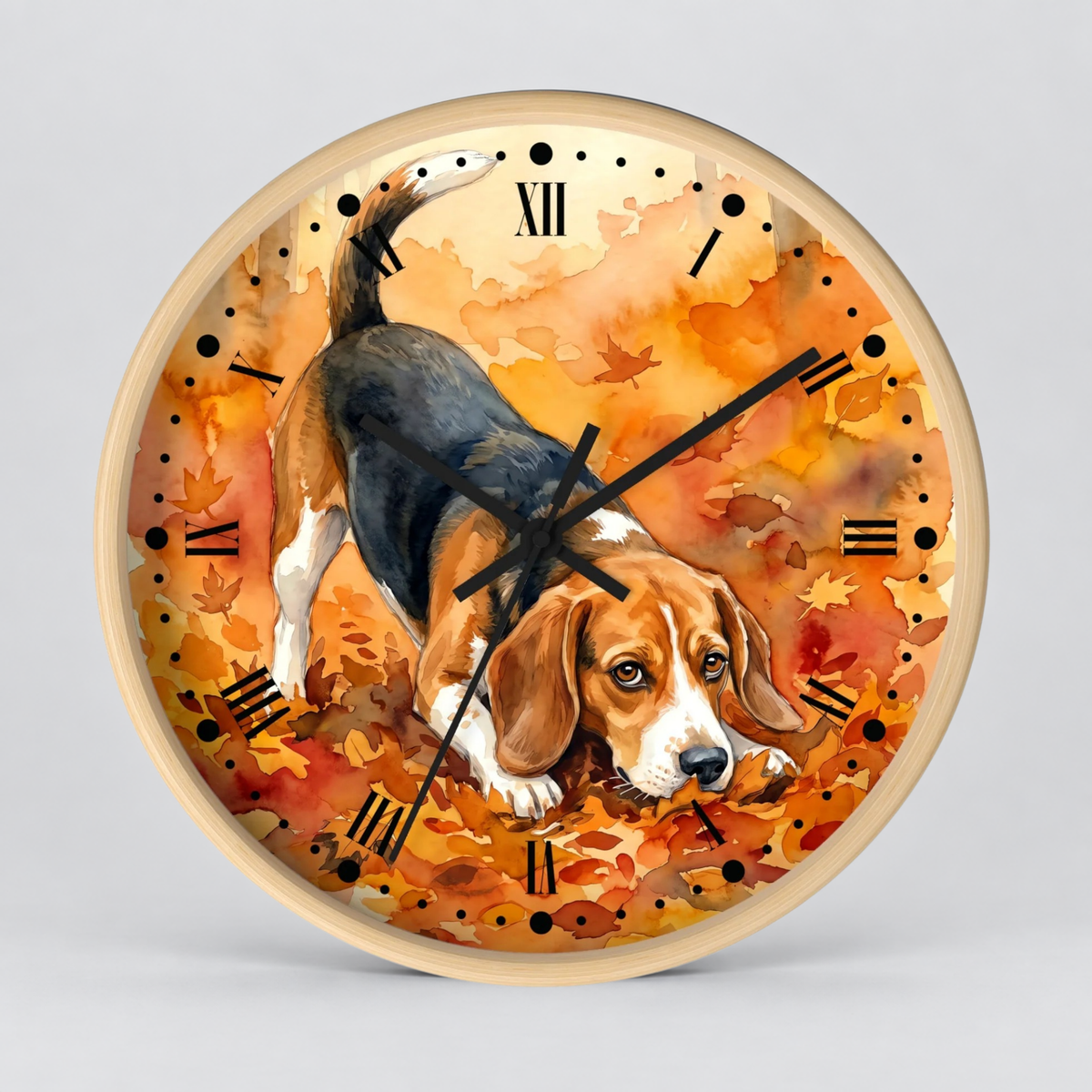 Round wall clock with a light wood frame and a printed dial showing a beagle dog walking through orange autumn leaves. The clock uses black Roman numerals and black hands, photographed against a light gray studio background.