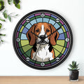 Round black wall clock with a Beagle dog design on a white wall with plants.