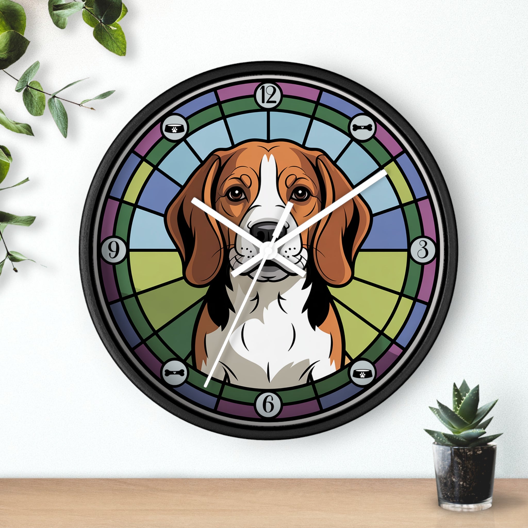 Round black wall clock with a Beagle dog design on a white wall with a plant in the background