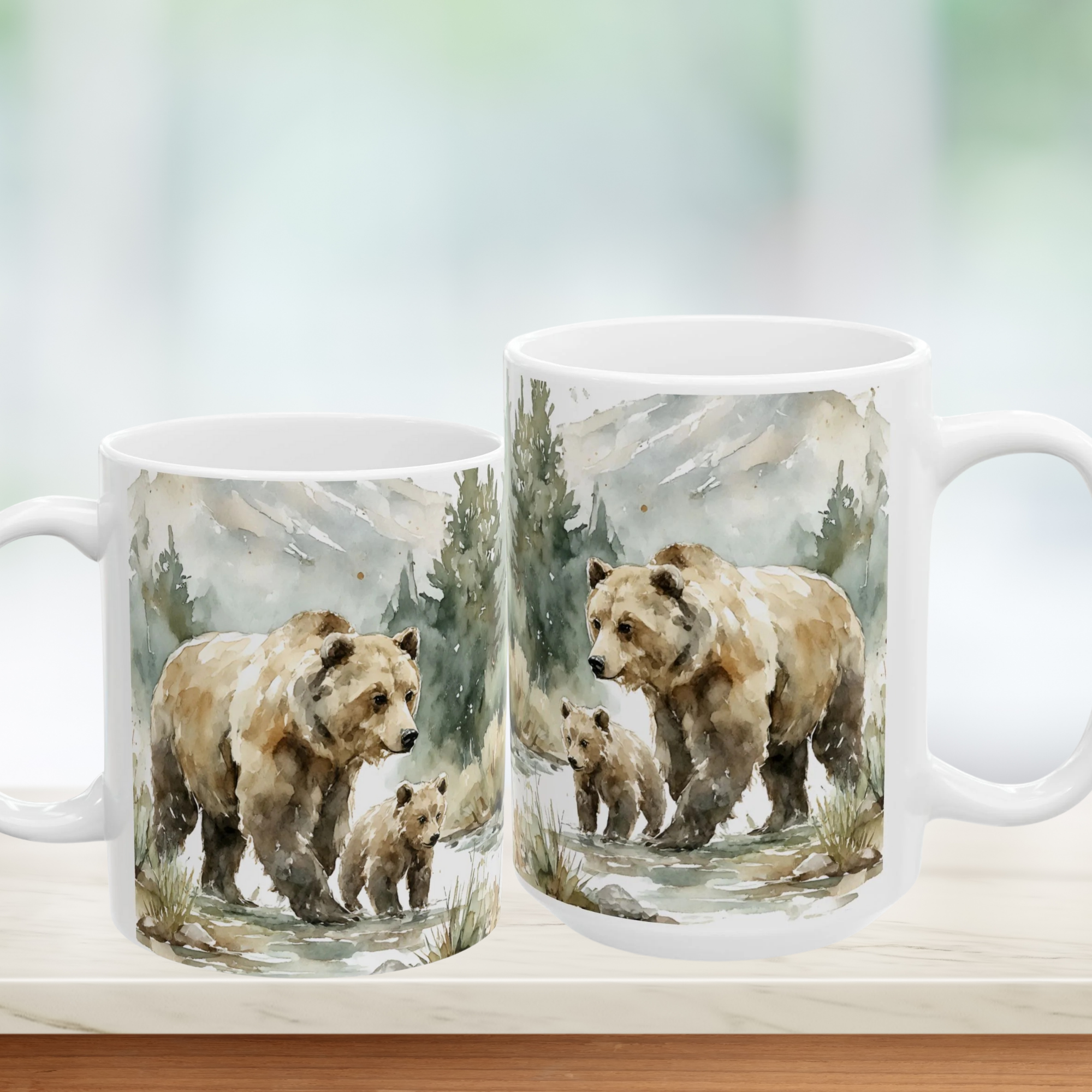 11oz & 15oz mugs with watercolor bear & cub illustrations on a wooden surface