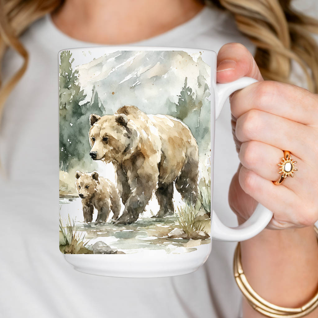 Person holding a mug with a  bear and cub watercolor painting design