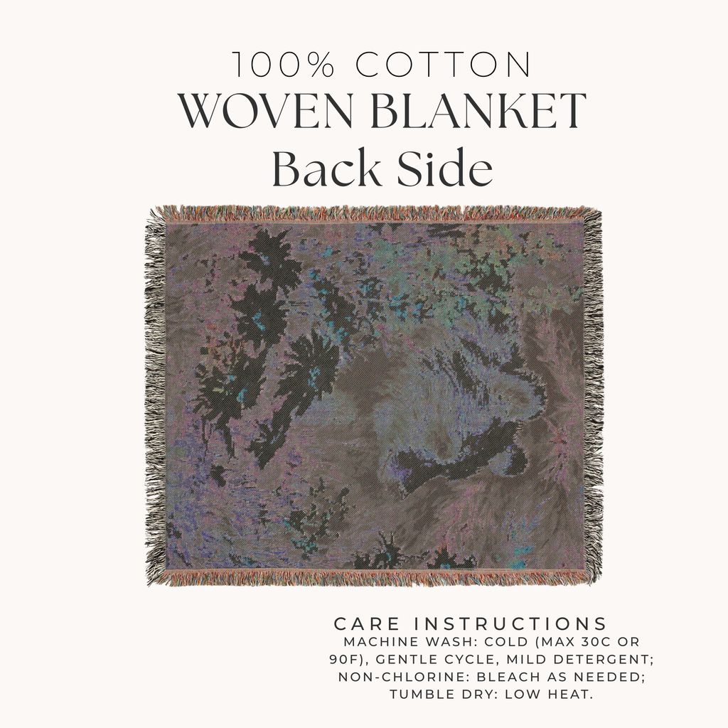 Back side of  a Woven blanket with care instructions on a white background