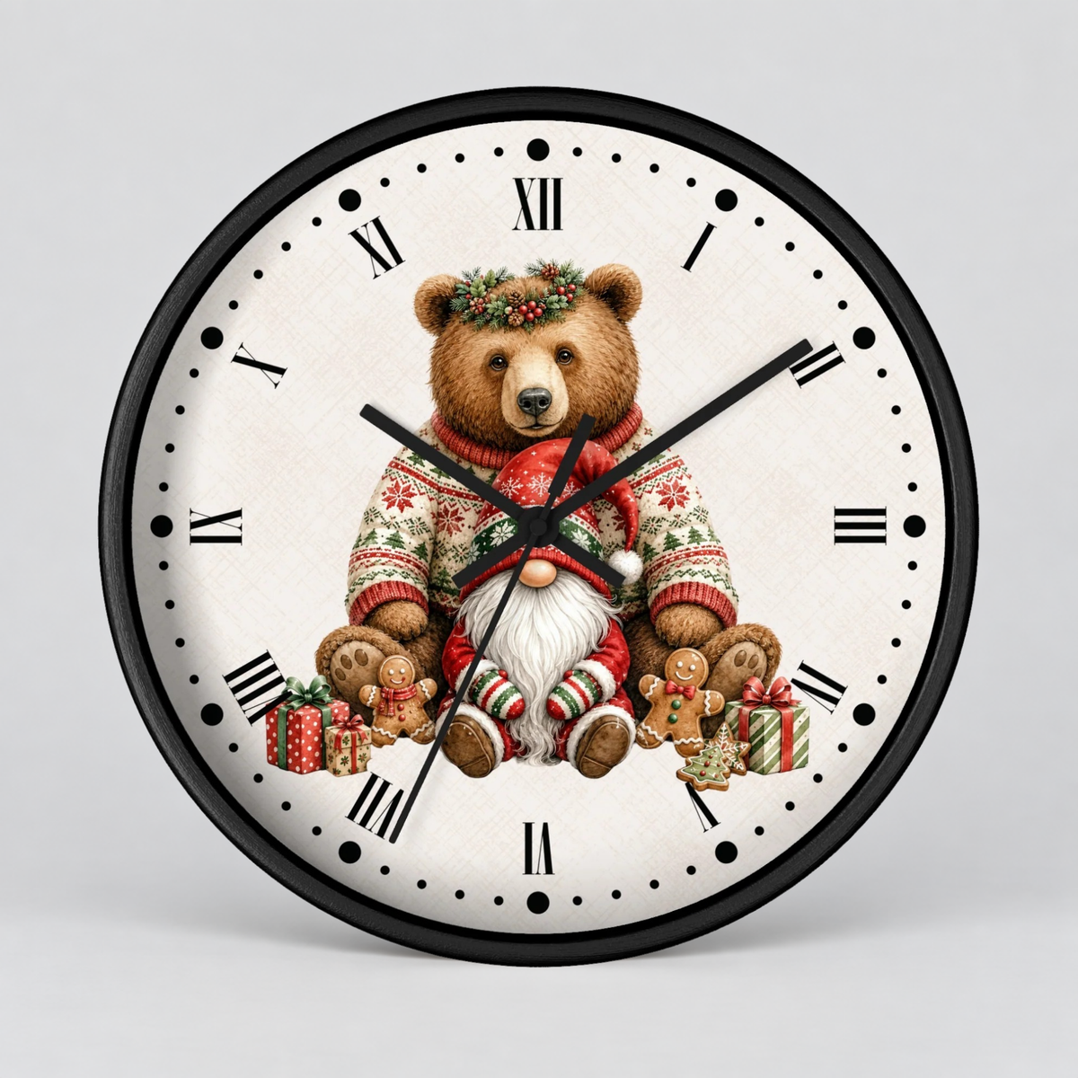 Round wall clock with a black frame and a festive illustration of a teddy bear dressed in a Christmas sweater, seated with gifts on a light cream dial with black Roman numerals.