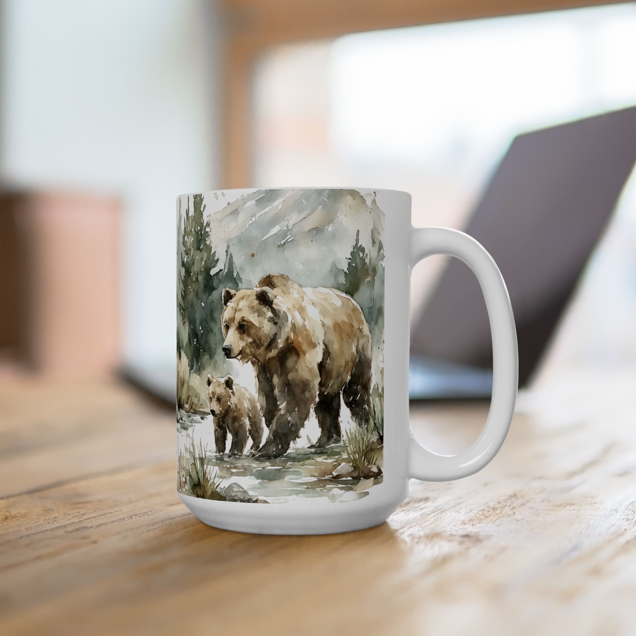 Mug with watercolor bear and cub painting design on a wooden desk