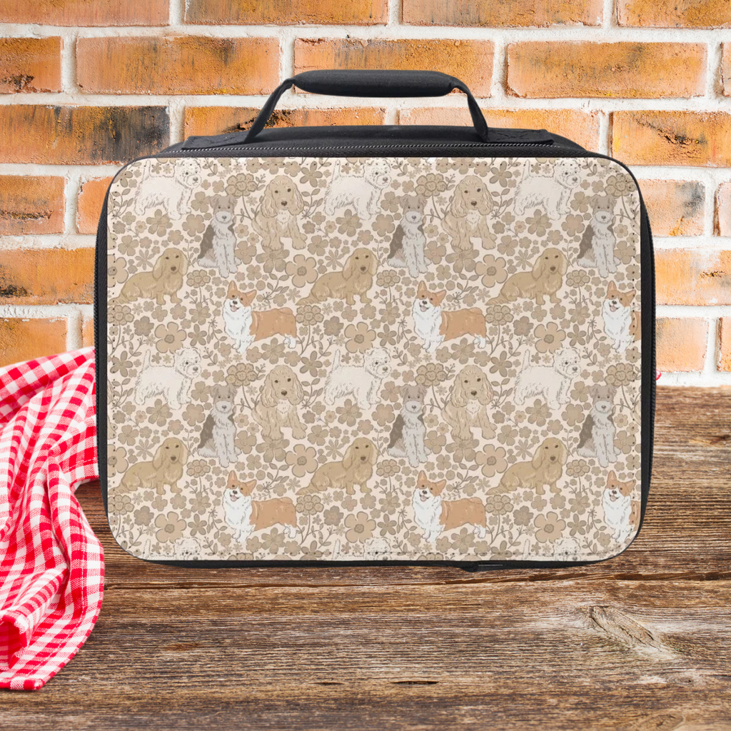 Lunch bag with dog & floral  pattern on a wooden picnic table and brick wall background