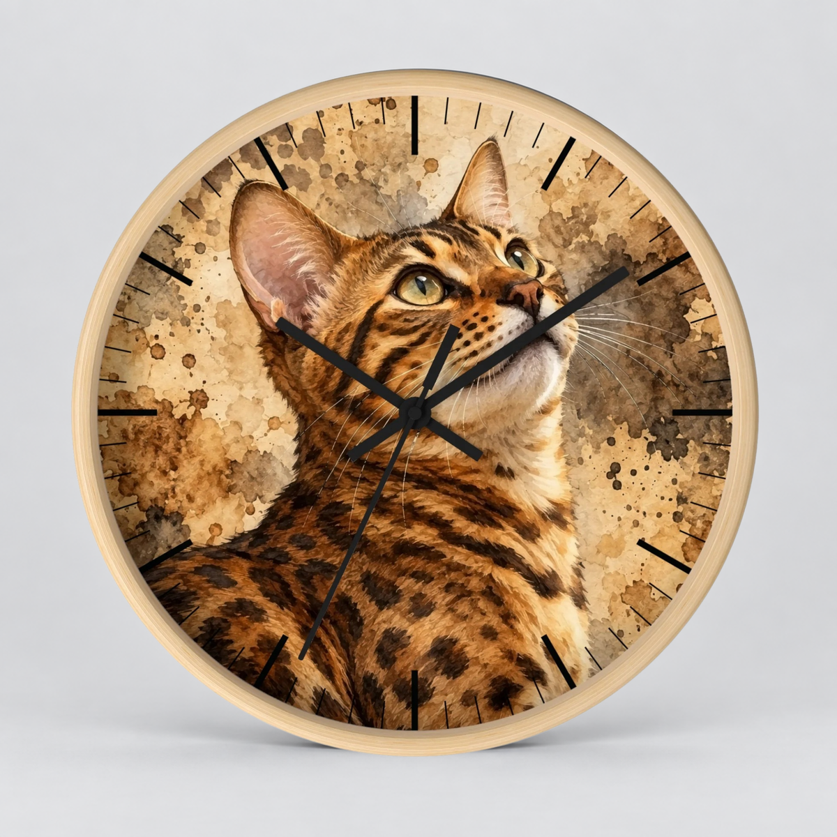Round wall clock with a natural wood frame and a printed cat face and fur design on the face, with black clock hands and no numerals, shown against a light gray background.
