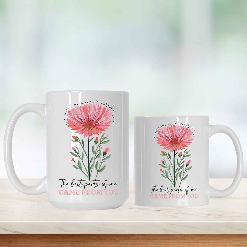 15oz & 11oz white mugs with a hand drawn floral design and text on a wooden surface.