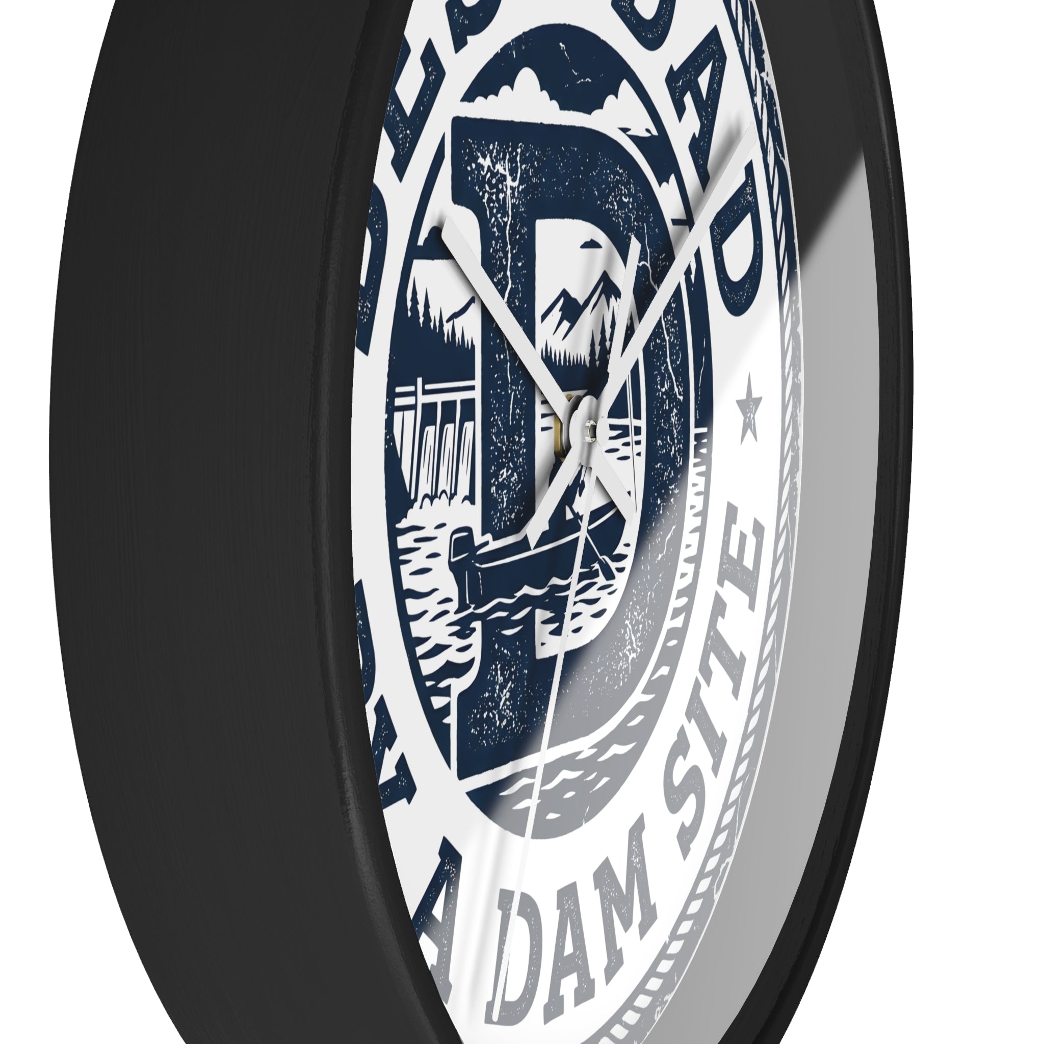 Side view of black wall clock with a design featuring text and illustrations on a black background
