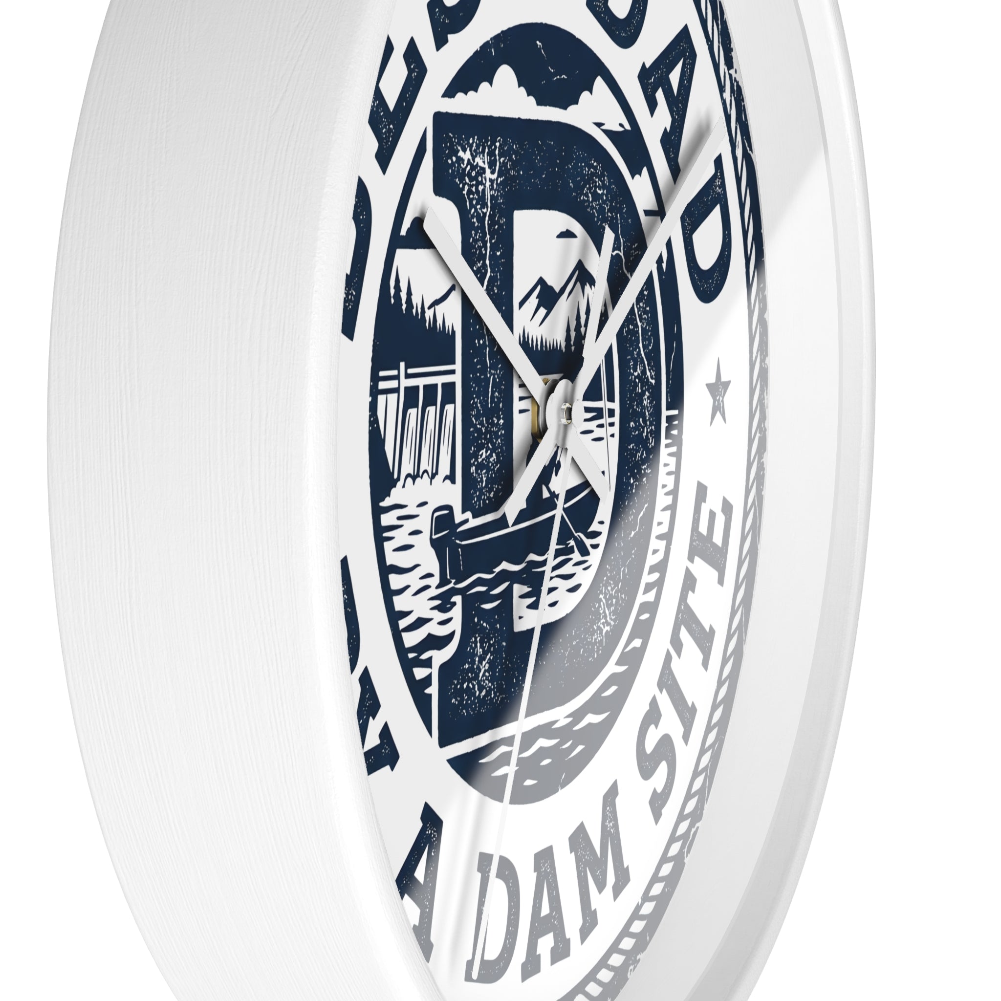 White wall clock with blue and black design on a white background