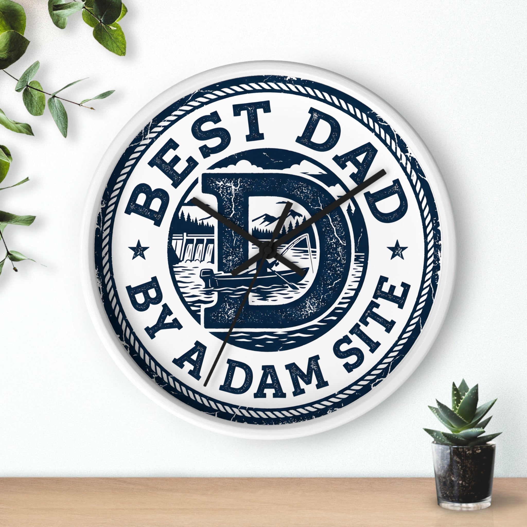 White Wall clock with 'Best Dad by a Dam Site' text on a white background