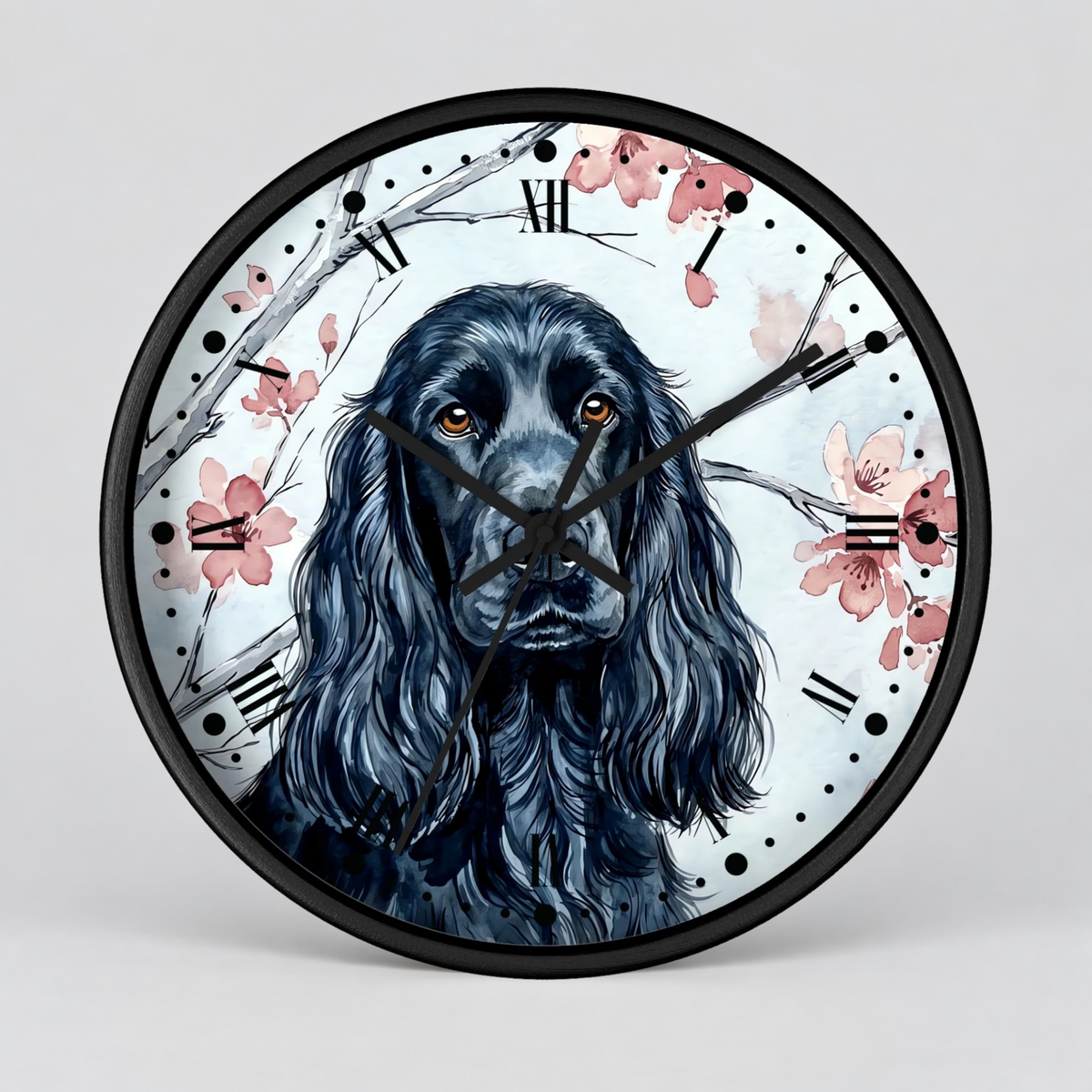 Round wall clock with a black frame and a printed illustration of a black long-haired dog on a white background with pink flowers and black Roman numerals.