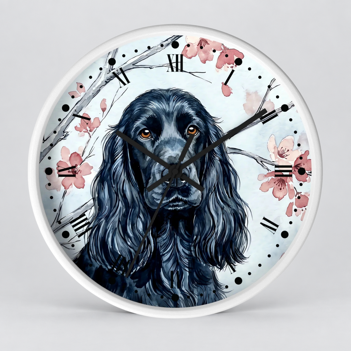 Round wall clock with a white frame and a printed illustration of a black long-haired dog on a light background, decorated with pink flowers and black Roman numerals.