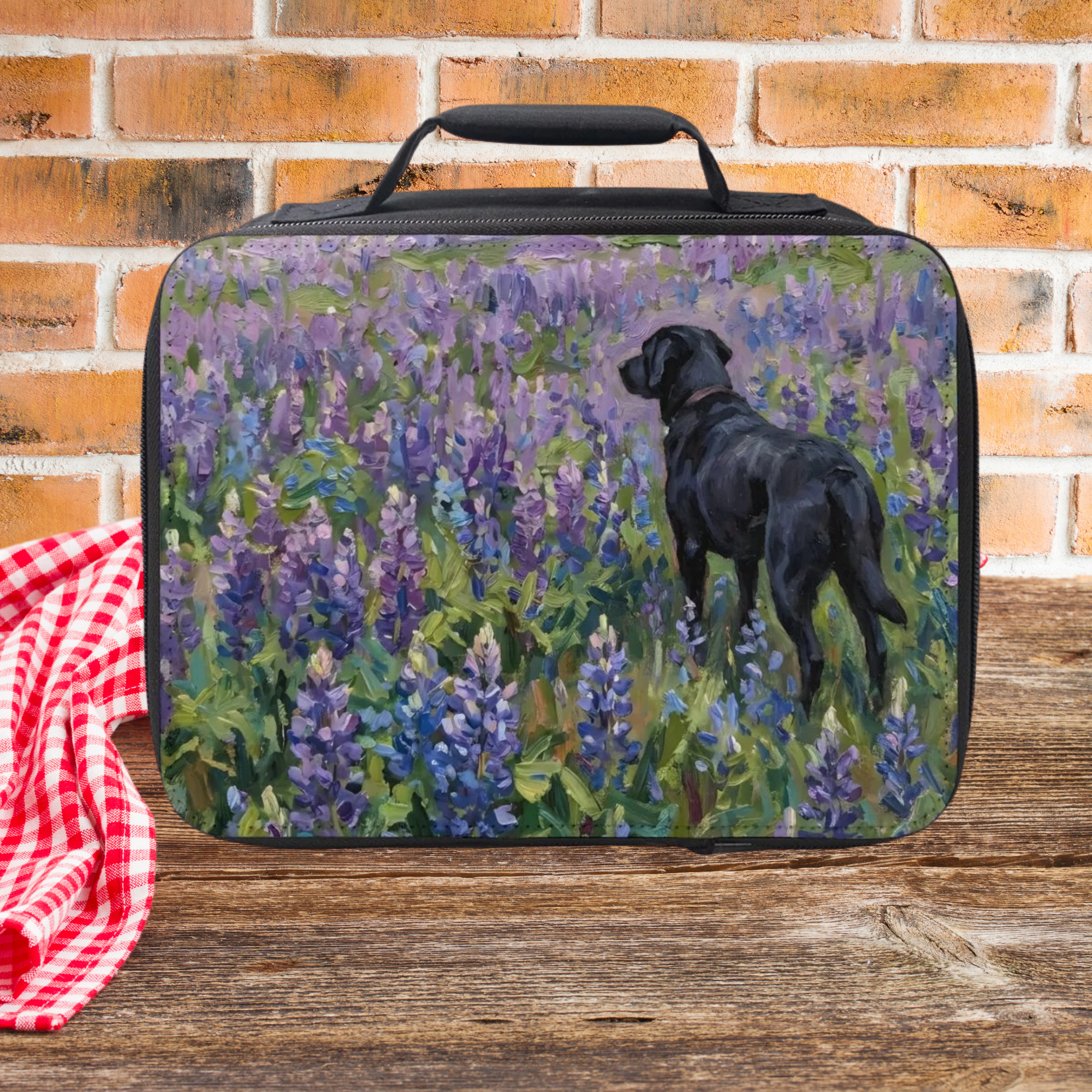 Lunch bag with a black dog and lupine design on a brick wall background
