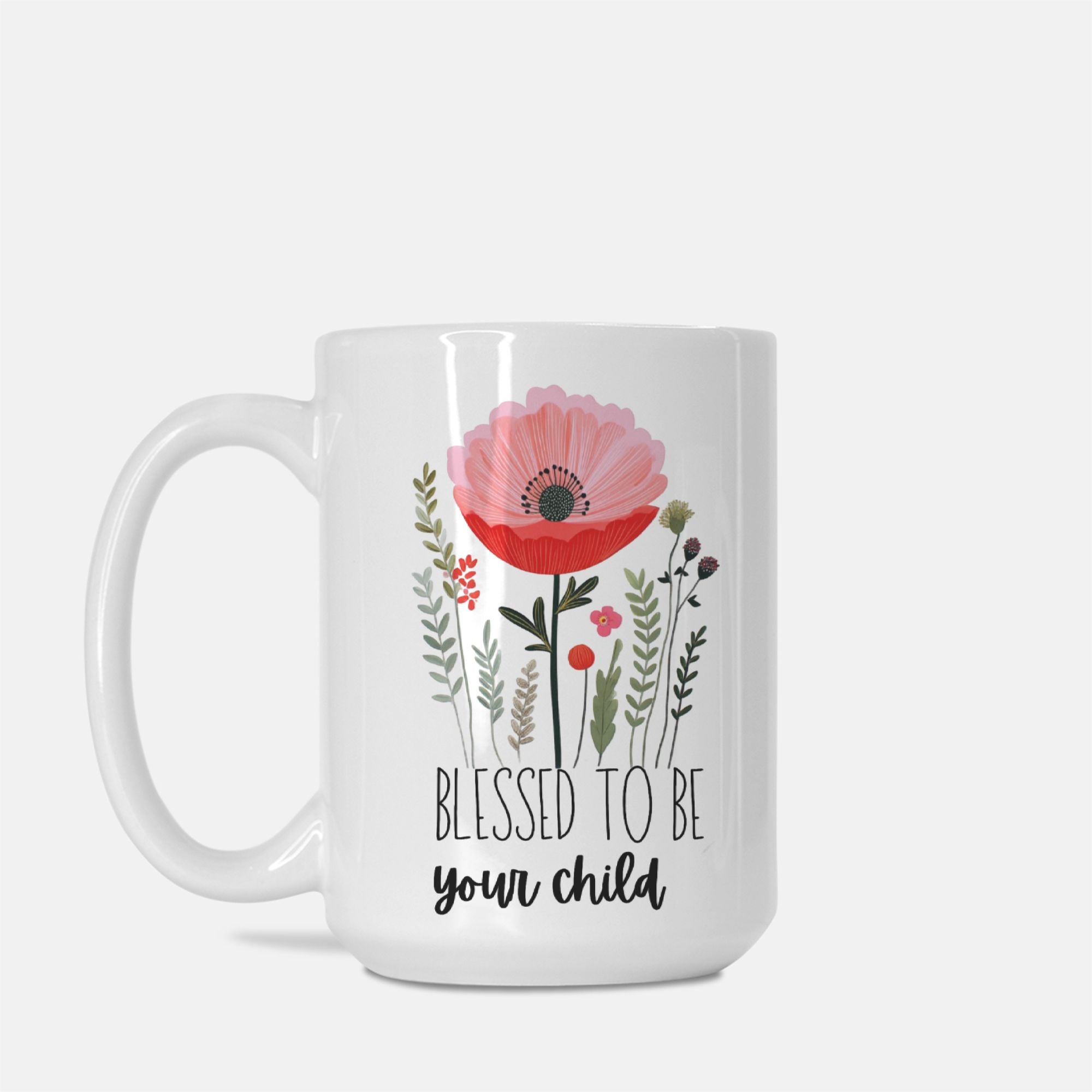 Left side of 15oz white mug with floral design and text 'Blessed to be your child' on a white background