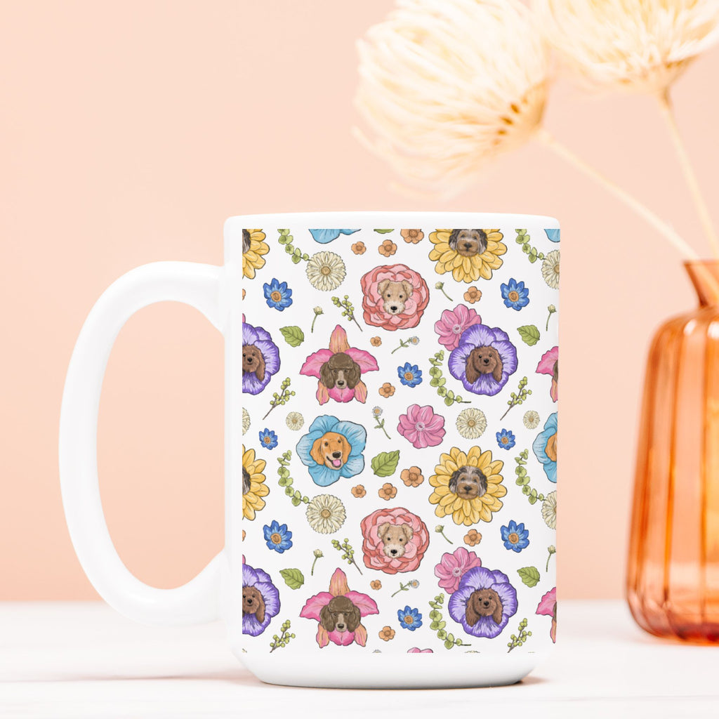 White mug with floral and dog pattern on a light pink background