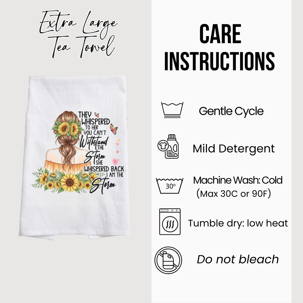 Tea towel with sunflower design and care instructions on a white background