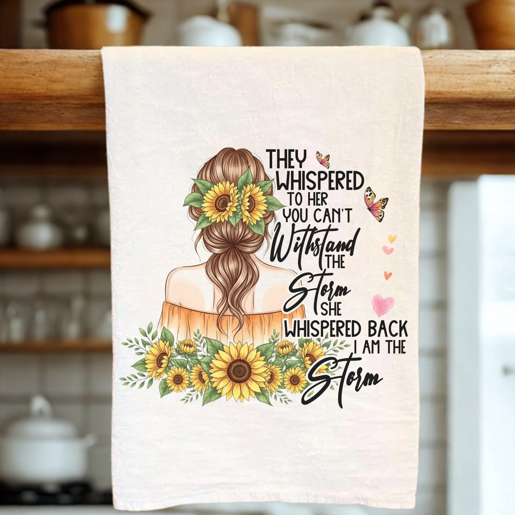 Tea Towel with a design of a woman with sunflowers and text in a kitchen setting