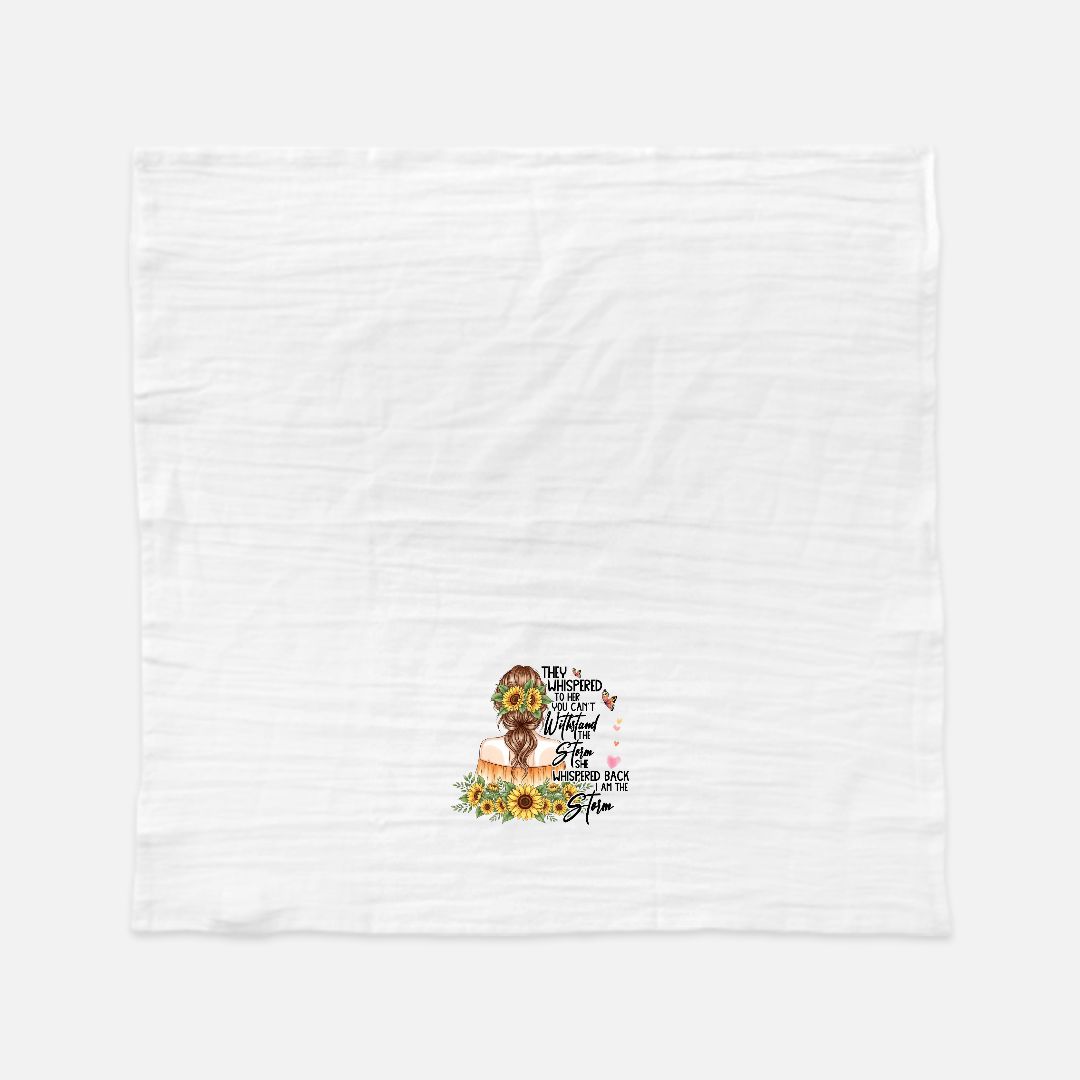 White tea towel with a design of a person with sunflowers and text on a white background