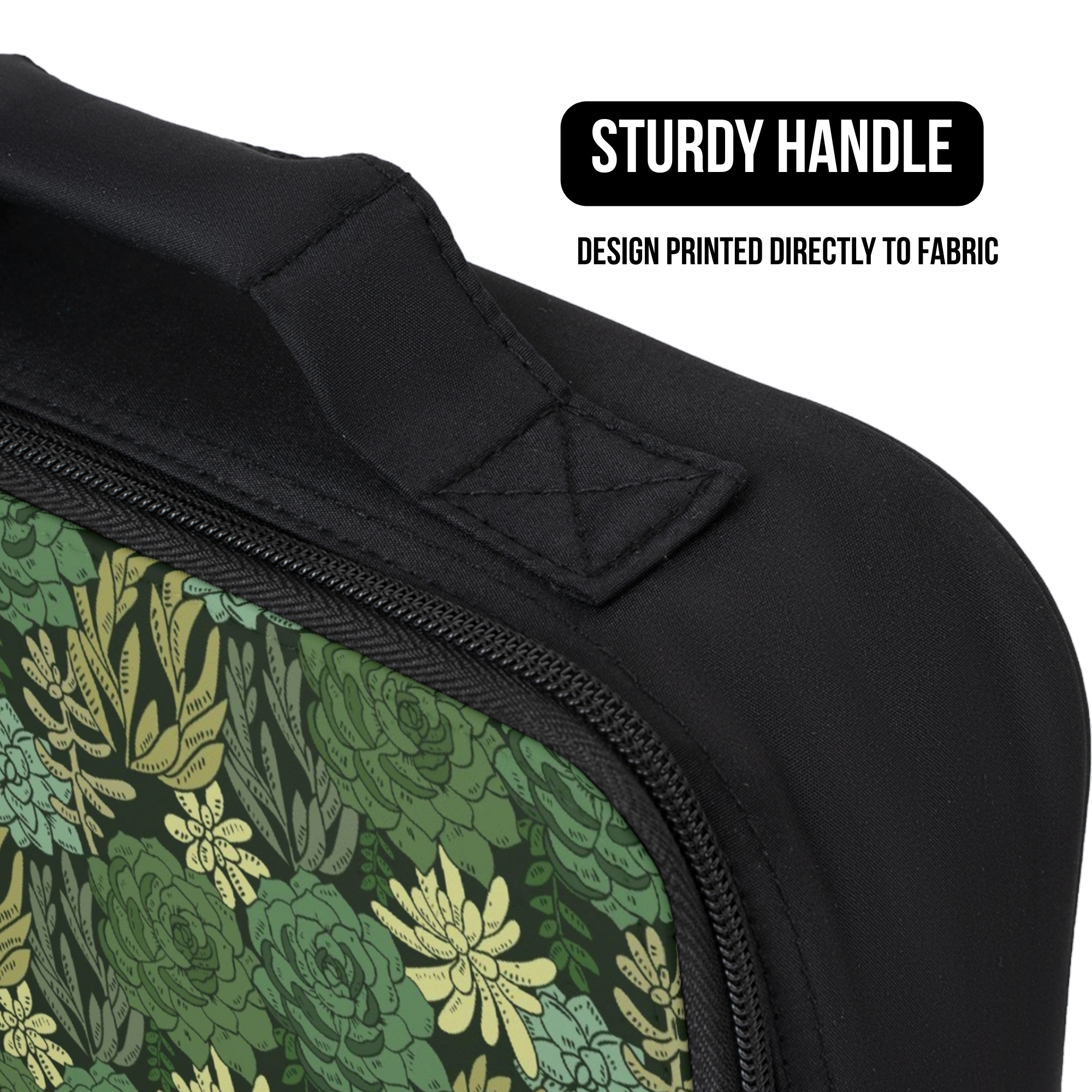 Black lunch bag with green floral pattern and sturdy handle, featuring text about fabric printing.